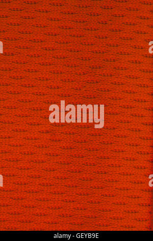 Red striped and woven material background Stock Photo