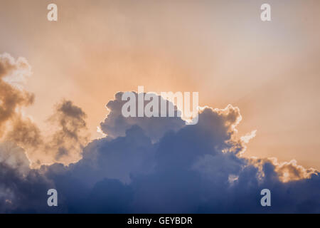 Horizontal picture of sunbeams and clouds in the sky Stock Photo