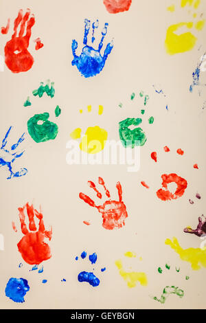 Picture of a seamless pattern with a colorful handprints Stock Photo