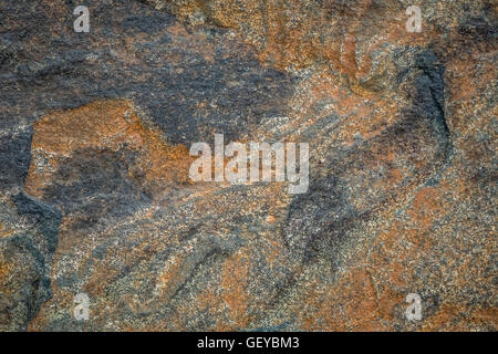 Rough stone rocky grunge background texture of a wall Stock Photo
