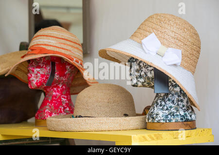 Patterned mannequin heads wearing hats on display at New Forest & Hampshire County Show, Brockenhurst in July Stock Photo