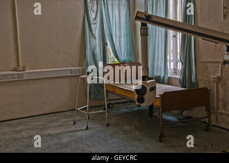 Beds and other medical equipment are within the closed St Clements Hospital in London's East End before the major redevelopment. Stock Photo