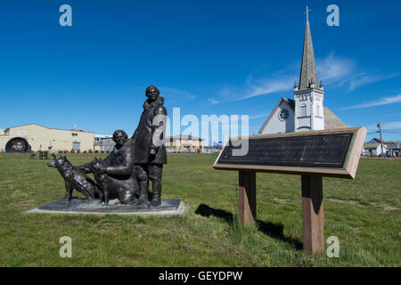 Alaska, Seward Peninsula, Nome, Anvil City Square. Monument of 'The Two Eskimo Boys' Stock Photo