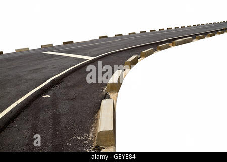 Abstract black asphalt road transport and curve with concrete box along beside the way isolated on white background Stock Photo