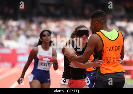 Libby Clegg & guide Chris Clarke after winning the 200m Womens - T11 T12 at the 2016 Müller Anniversary Games IPC Grand Prix Final, London Olympic Stadium, Stratford Stock Photo