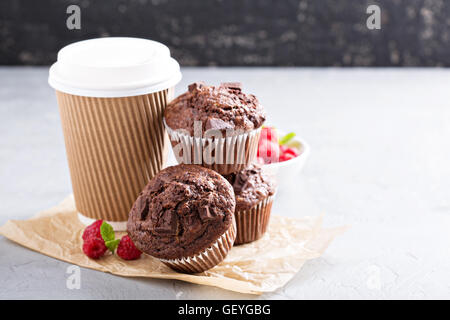 Chocolate muffins with coffee to go Stock Photo