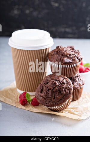 Chocolate muffins with coffee to go Stock Photo