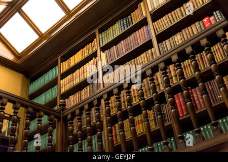 Low angle view of Books arranged in bookshelves Stock Photo
