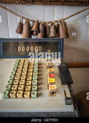 Details of an dirty old rusty vintage cash register Stock Photo