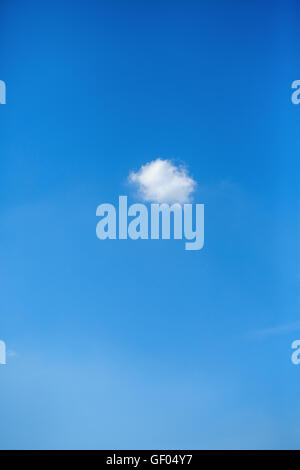 Small cute cloud on the blue clear sky. Eco concept Stock Photo