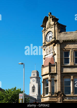 Clock on the Old Yorkshire Penny Bank Building with Town Hall behind Barnsley South Yorkshire England Stock Photo