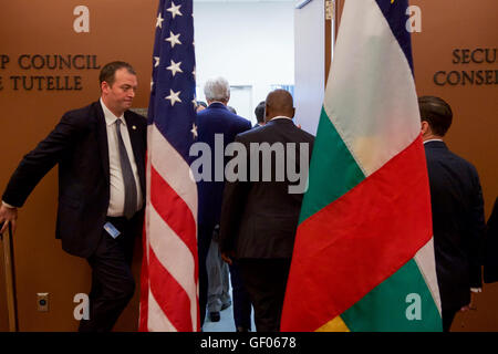 Secretary Kerry and Central African Republic President Touadéra Walk Into a Room to Hold a Meeting After Signing the COP21 Climate Change Agreement on Earth Day in New York Stock Photo