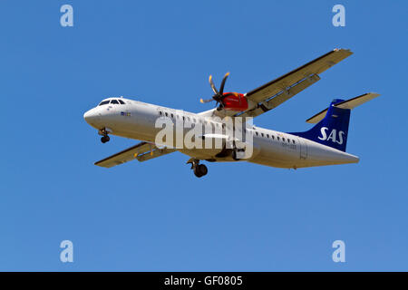 SAS operated by Jet Time, turboprop ATR 72-600, flight SK680, OY-JZE, on final approach to Copenhagen, Denmark from Berlin. Stock Photo