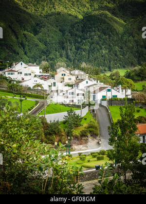 White homes in Furnas town, which lies in the volacano crater, Sao Miguel, Azores, Portugal Stock Photo