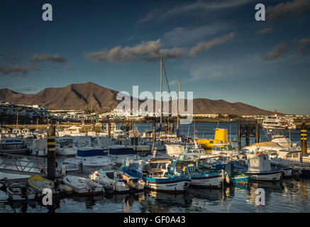 Colorful boats in a harbour in Playa Blanca, Lanzarote, Canary Islands, Spain. Picture taken 22 April 2016 Stock Photo