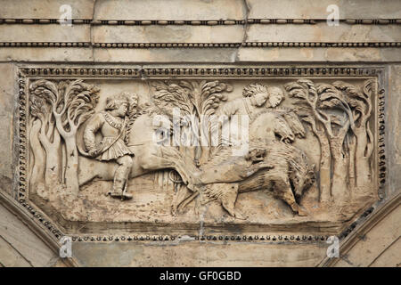 Royal wild board hunting. Renaissance relief on the Summer Palace of Queen Anna in the Royal Garden of Prague Castle in Prague, Czech Republic. Stock Photo