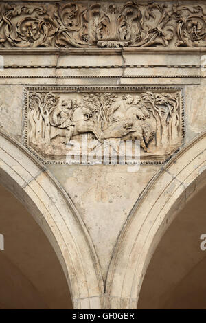 Royal wild board hunting. Renaissance relief on the Summer Palace of Queen Anna in the Royal Garden of Prague Castle in Prague, Czech Republic. Stock Photo