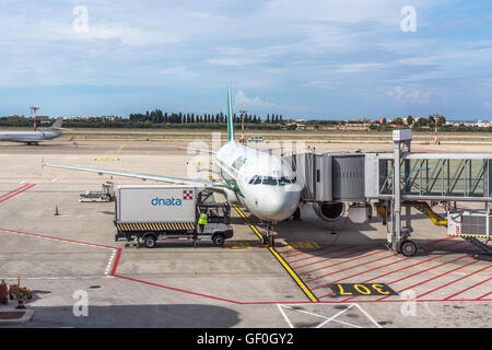 BARI, ITALY - SEPTEMBER 14: ALITALIA airplane parked at terminal. loading and maintenance operations before to flight. KAROL WOJ Stock Photo