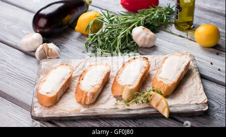Slices of bread with butter. Stock Photo