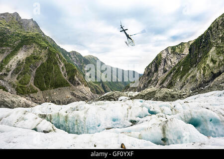 Helicopter on Franz Josef Glacier, New Zealand Stock Photo