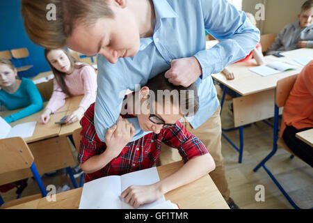 student boy suffering of classmate mockery Stock Photo