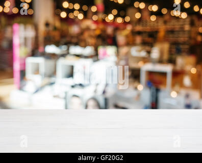 Wooden empty table and blurred background store Stock Photo