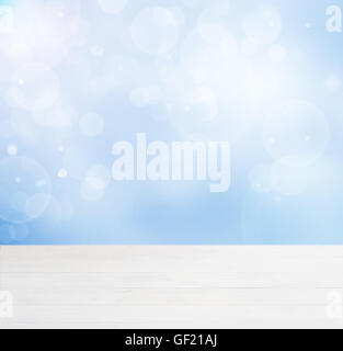 Wooden empty table in abstract blue background Stock Photo