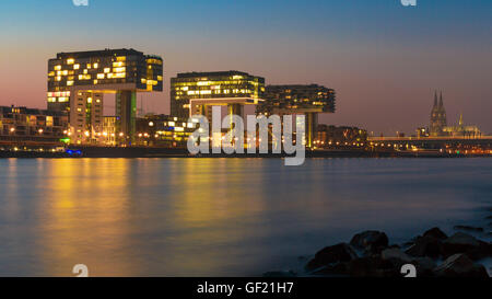 Crane Houses, River Rhine and Cathedral, Cologne, Germany Stock Photo