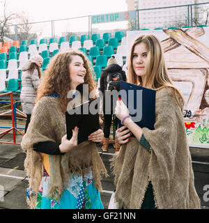 Gomel, Belarus - March 12, 2016: Two beautiful girls participating in the celebration Maslenitsa Shrovetide Stock Photo