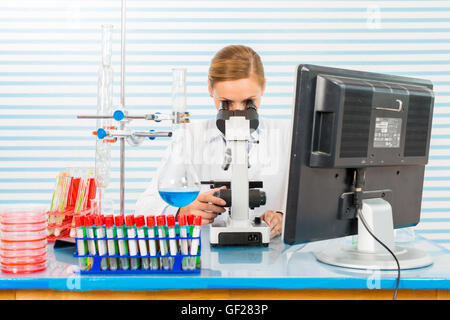 Young scientist works in modern biological lab Stock Photo