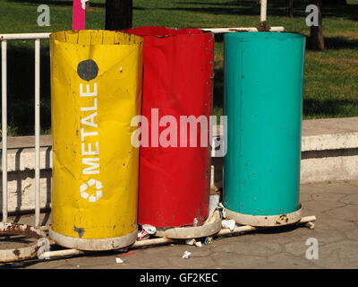 Brightly painted metal refuse recycling bins in Tirana capital of Albania Stock Photo