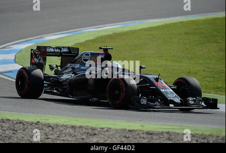 Hockenheim, Germany. 29th July, 2016. Spanish F1 driver Fernando Alonso of McLaren Honda in action during the first free training at the Hockenheimring in Hockenheim, Germany, 29 July 2016. The German Grand Prix takes place on 31.07.2016. PHOTO: WOLFRAM KASTL/DPA/Alamy Live News Stock Photo