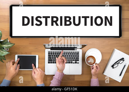 DISTRIBUTION  Two Businessman working at office desk and using a digital touch screen tablet and use computer, top view Stock Photo