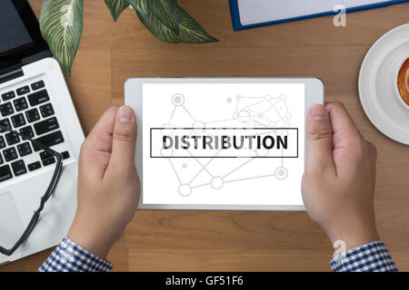 DISTRIBUTION  man hand Tablet and coffee cup Stock Photo