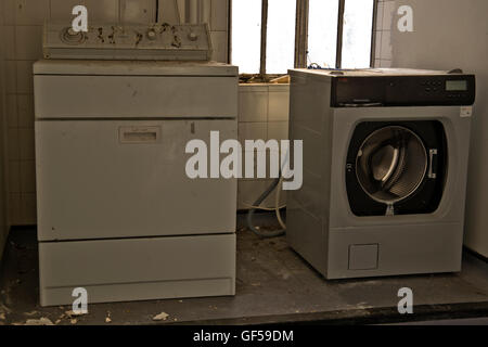 Laundry room within part of the closed St Clements Hospital in London's East End before the major redevelopment. Stock Photo