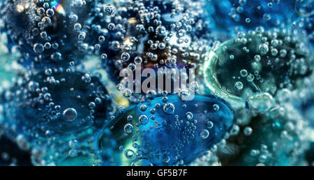 A set of glass balls in water with bubbles Stock Photo