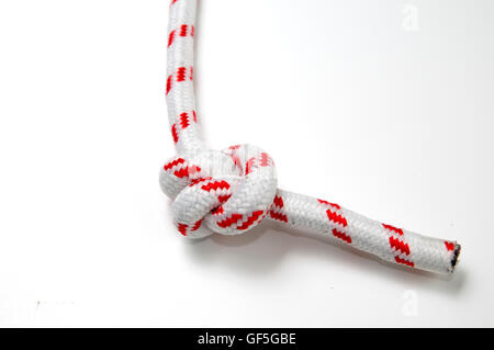 Double overhand knot AKA double granny knot on white background Stock Photo