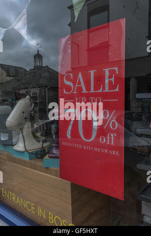 High street sales posters - as metaphor for concept of recession, economic slow-down, falling sales, bargains and competition. Stock Photo