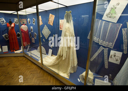 UK, England, Devon, Honiton, High Street, Allhallows Museum interior, lace fashion gallery Stock Photo