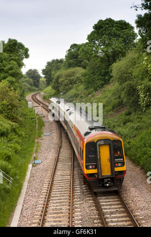 UK, England, Devon, Honiton, train departing railway station on Exeter-LondonWaterloo mainline Stock Photo
