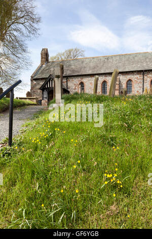 St Marys Church in the village of Beaumont, Cumbria UK - It was built of stones from Hadrians Wall which ran past the site. Stock Photo