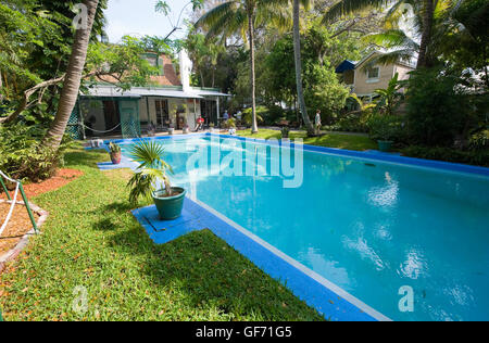 KEY WEST, FLORIDA, USA - MAY 03, 2016: Swimming pool in the garden of the Hemingway House in Key West in Florida. Stock Photo