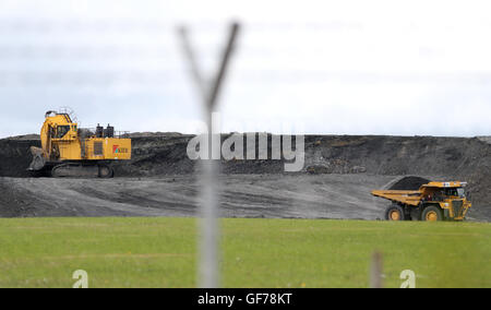 Diggers near to the proposed site of Hinkley Point C nuclear power station in Somerset, as energy giant EDF is set to make its long-awaited final investment decision on the planned station, ending doubts over the massive Â£18 billion project. Stock Photo