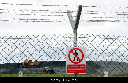 Diggers near to the proposed site of Hinkley Point C nuclear power station in Somerset, as energy giant EDF is set to make its long-awaited final investment decision on the planned station, ending doubts over the massive Â£18 billion project. Stock Photo