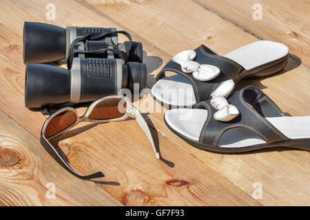beach accessories on wooden board. summer vacation concept Stock Photo