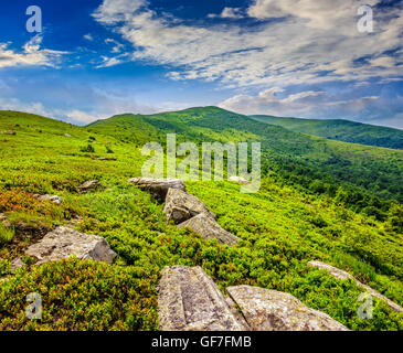 white sharp stones and boulders on the hillside on top of mountain ...