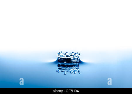 Water splash crown after falling a drop Stock Photo