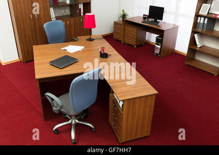 laptop and computer on a desk at modern office Stock Photo