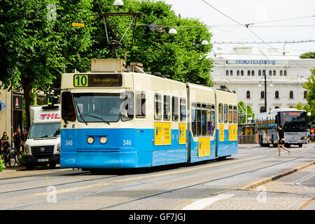 Goteborg, Sweden - July 25, 2016: Blue and beige tram in central city. The electric trams are run by Vasttrafik and transport co