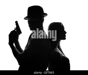 Silhouette of detective with beautiful woman isolated on white background Stock Photo